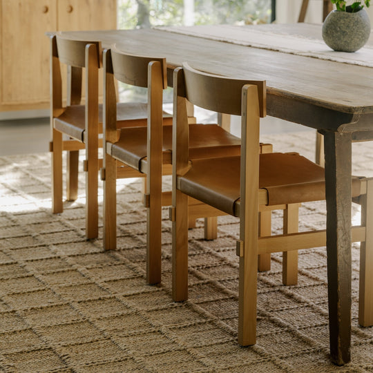 Leather Sling Dining Chairs: Effortless Style Meets Timeless Craftsmanship